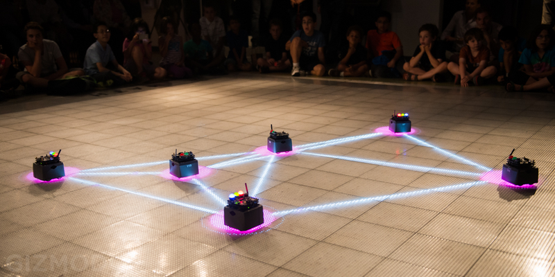 Illustration for article titled Bee-Inspired Bots Skitter and Swarm at NYC's Museum of Mathematics